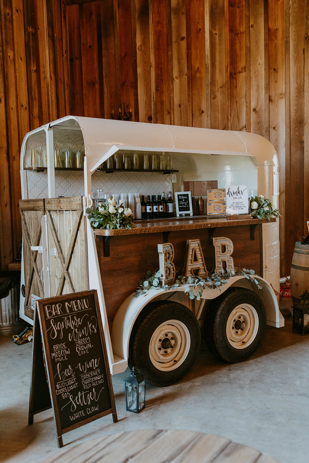 mobile bar at wedding, wedding bar ideas, western winter wedding ideas. photo by codi baer photography
