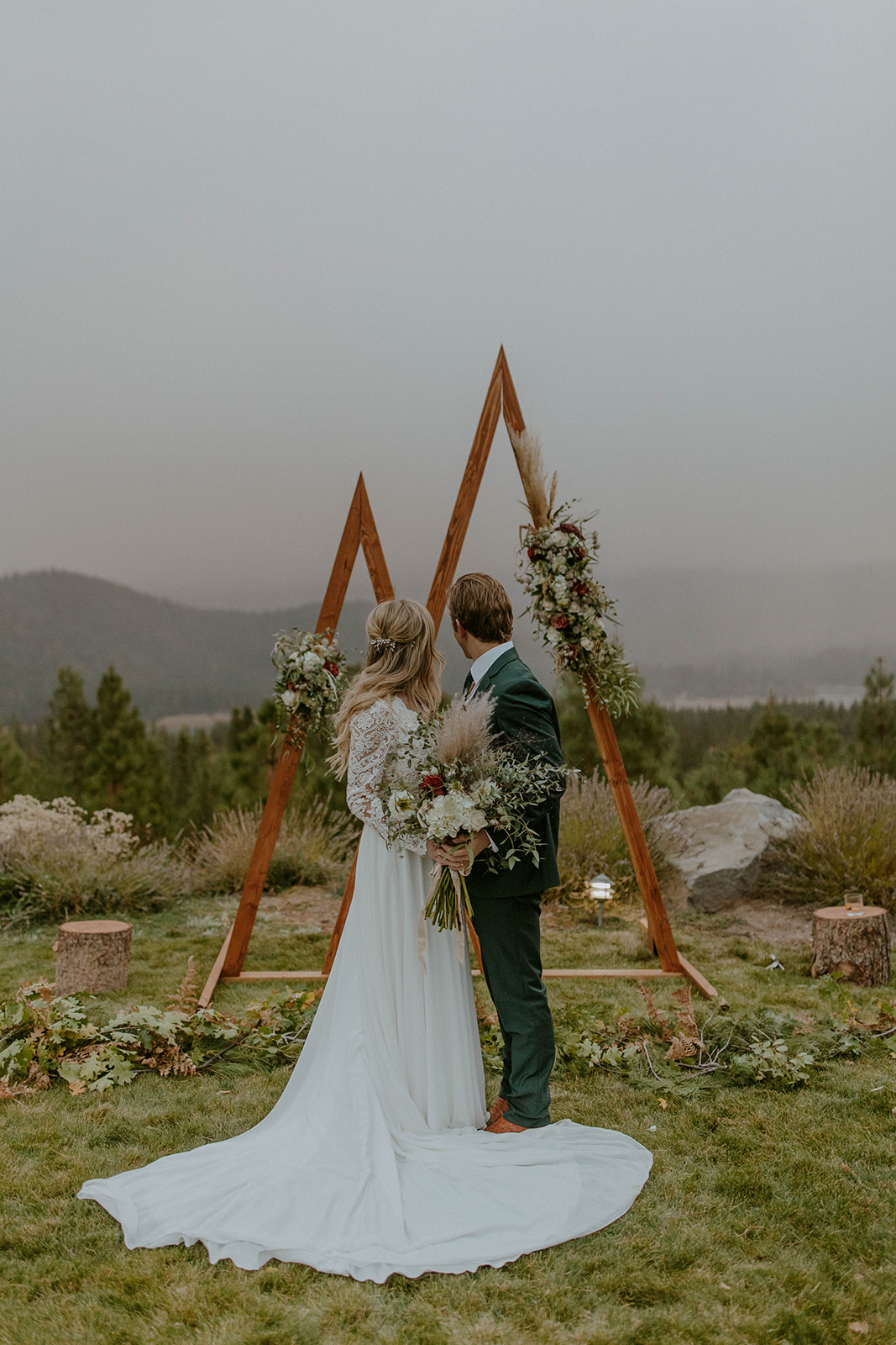 couple looking out at mount shasta at their intimate fall wedding 